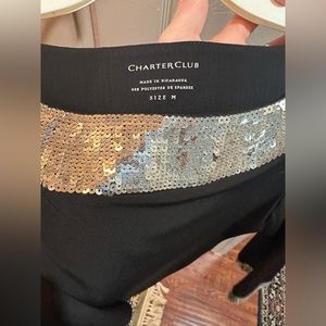 Black dress with sequin cuffs and neckline